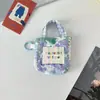 Bolsa para Auriculares Pequeña Fresca Floral Estilo Coreano Mini Diseño de Nicho Bolsa de Almacenamiento Anti-Caídas y Anti-Rozaduras Cubierta Protectora para Auriculares Bluetooth