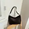 Bolso de axila de textura tejida de nicho estilo coreano transfronterizo para mujer, nuevo popular de verano 2026, bolso versátil de hombro y cruzado tipo bola de masa