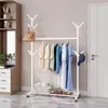 Perchero de pie de hierro forjado con doble barra, simple estante multiusos para ropa para dormitorio del hogar con ruedas