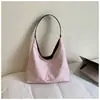 Bolsa tote de gran capacidad estilo perezoso 2026 nueva bolsa para mujer versión coreana bolso de hombro simple para el trabajo y el trayecto bolso de axila