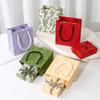 Bolsa de embalaje para caja de joyería al por mayor de fábrica Bolsa de papel de embalaje de lujo ligero portátil para cosméticos Guofeng Bolsa para regalo de joyería