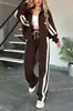 Traje de Moda Deportiva Casual 2025 Estilo Coreano Chaqueta Rayada Retro Conjunto de Pantalones de Manga Larga Sencillos Otoño