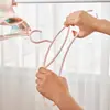 Percha de lujo ligero simple antideslizante para ropa soporte al por mayor semicírculo sin costuras de plástico para el hogar niños