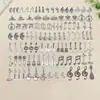 Paquete Mixto Transfronterizo de 20/50/100 Colgantes de Instrumentos con Símbolos Musicales de Plata Antigua Accesorios para Pulseras Llaveros Joyería DIY