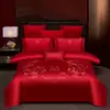 Juego de ropa de cama de lujo estilo chino, hecho de algodón 100% de fibra larga, un juego de cuatro piezas que incluye una sábana y una funda de edredón de algodón puro rojo, perfecto para la alcoba de una recién casada.
