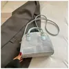 Bolso tipo cubo de alta gama estilo coreano para mujer 2026 Modelo Nuevo Bolso de mano simple y elegante Bolso bandolera cruzado de hombro moderno para ropa casual de trabajo