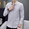 Camisa de manga larga informal de negocios de nueva moda de primavera para hombre, sencilla, fácil de ajustar, con personalidad, estampada y atractiva.