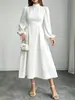 Vestido europeu e americano transfronteiriço 2026 Amazon elegante e sofisticado de corte justo, cor sólida, gola semi-alta, manga longa, requintado