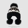 Gorro de lana para niños de comercio exterior, gorro de punto jacquard estilo americano con tres pompones, gorro pullover estilo coreano para proteger las orejas para niños mayores, cálido para niños