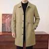Suministro directo de fábrica gabardina larga para hombre con solapa, abrigo cortavientos de un solo botón para hombre casual de negocios de primavera y otoño, prenda exterior de moda