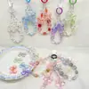 Fantasía de Verano Acrílico UV Hielo Transparente Pajarita Qq Agujero Recto Cadena para Teléfono Móvil DIY Accesorios para el Cabello Material de Colgante Joyería