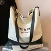 Bolso Casual de Gran Capacidad para Mujer 2025 Nuevo Popular Versátil Bolso de Hombro de Lona Estilo Popular de Celebridad de Internet Bolso Cruzado Tipo Cubo