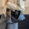 Bolso de hombro tipo tote grande de alta capacidad 2026 brillante, versátil para el uso diario, bolso de mano de otoño, lujo ligero, estilo nuevo, bandolera para ir al trabajo, estilo coreano de moda
