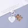 Llavero de Oso Transparente de Gelatina Colgante Pequeño Transparente Lindo Etiqueta de Corazón Accesorio DIY Encanto de Macarrón