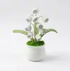 En Stock Tejido a Mano 9 Cabezas Muguete Lindo Hilo de Cuatro Hebras Planta en Maceta Decoración de Escritorio Adorno Planta Artificial en Maceta Venta al por Mayor