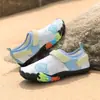 Fabricante directo de Quanzhou zapatos de buceo antideslizantes para niños, snorkeling, natación, secado rápido, vadeo, rafting en agua, senderismo en arroyos, zapatos de playa para hombres y mujeres