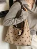 Colección de otoño 2026 transfronteriza: diseño único, gamuza de lunares, bolso de hombro color block, bolso de axila moderno y retro
