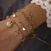 Pulseras Florales Versátiles en Capas de Moda Europea y Americana, Pulseras Multicapa de Corazón y Mariposa de Acero Inoxidable de Lujo Ligero de Alta Gama al por Mayor