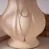 Colar de Aço Inoxidável Pingente Gota d'Água Camada Dupla Colar de Clavícula de Luxo Leve Nicho Corrente para Clavícula Europeu e Americano Transfronteiriço Exquisito Versátil Atacado