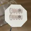 Gu Jingyu: Suave y simple, estilo elegante, espejo mágico aurora plateado ojo de gato, pedrería apilada, uñas postizas hechas a mano