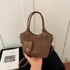 Bolsa de ombro estilosa nova 2026 transfronteiriça, uma bolsa de mão de nicho e alta qualidade com design moderno e minimalista, versátil e fácil de combinar, bolsa transversal de cor sólida