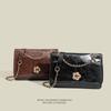Bolsa de Ombro Única com Textura de Corrente Versátil para o Dia a Dia Primavera 2026 Nova Bolsa Clássica Retrô de Axila Bolsa Transversal Fashion para Mulheres