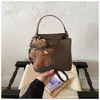 Bolso Pequeño de Textura Mate Retro para Mujer 2026 Nueva Moda Bolso Cruzado Versátil Bolso Cubo de Mano Súper Popular en Instagram