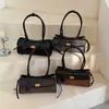 Bolso de hombro casual de nicho de alta gama nuevo 2026, bolso simple para debajo del brazo, bolso de mano retro moderno para mujer