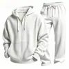 Conjunto de dos piezas para hombre de estilo europeo y americano, tejido gofre liso, manga larga y pantalón largo, un atuendo casual simple y versátil.