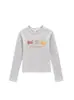 Camiseta Branca e Cinza com Ombro Reto, Gola Redonda e Manga Longa para Mulheres, Nova Estampa de Desenho Animado 2026, Top Versátil Slim-Fit que Rejuvenesce