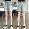 Shorts de Mezclilla de Verano para Niñas 2026 Nuevo Estilo Pantalones Casuales Delgados para Niños Ropa Exterior Moderna Estilo Coreano Pantalones Cortos