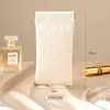 Nuevo estuche de cuero a cuadros de alta gama para gafas para mujer, bolsa de almacenamiento de lápiz labial con resorte de cierre automático, bolsa portátil impermeable para viajes