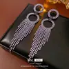 Pendientes de Plata Estilo Europeo y Americano con Círculos Incrustados de Diamantes y Borlas, Sensación de Lujo Ligero y Gama Alta, Pendientes Exagerados de Nicho con un Diseño Único