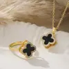 Diseño de Nicho Europeo y Americano Anillo Abierto Giratorio con Forma de Trébol de Cuatro Hojas Microincrustado de Circonita Acero Inoxidable Collar de Flor para Mujer