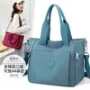 Bolso Casual para Mujer Nuevo de Tela de Nylon para Hombro Cruzado de Dos Usos Estilo Coreano Combinable para Viajes Mamá Bolso Cruzado Venta al por Mayor