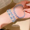 Pulsera con Cierre de Flor de Circonita Chapada en Oro Real de 18k Sentido del Diseño Pulsera de Nicho Lujo Ligero Sensación de Alta Gama Pulsera Retro