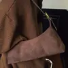 Bolso de moda de nicho tipo baguette para axila para mujer 2025 Nuevo Retro Textura esmerilada Bolso de mano para hombro Bolso cruzado pequeño