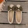 Zapatos mocasines casuales transfronterizos talla grande 2026 con corte bajo, lunares, punta redonda, moño, suela plana para mujer, modelo nuevo
