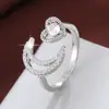 Mês de Vendas Quentes Transfronteiriças Anel Coração de Diamante Completo Lua Crescente Zircônia Coração Vazado Anel Feminino Venda Direta de Fábrica
