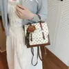 Nova Bolsa Elegante de Temperamento 2026 Nova Mochila Versátil Primavera Bolsa Fofa Estilosa de Alta Qualidade