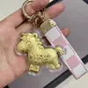 Shuibei Oro 999 Oro Puro Hazte Rico Inmediatamente 20Mg Llavero Cadena Dorada para Teléfono Móvil Colgante Regalo de Cumpleaños