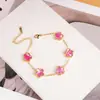 Popular Pulsera de Acero de Titanio de Lujo Ligero Europeo y Americano con Trébol de Cinco Hojas de Nácar de Doble Cara Transfronteriza para Mujer Venta al por Mayor desde Fabricante
