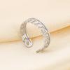 Rueda de cartas para mujer, anillo de dedo hueco con nudo retorcido transfronterizo, anillo de acero de titanio de moda de lujo ligero, multiestilo
