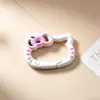 Hebilla de resorte con forma de lazo y efecto de goteo de aceite de color caramelo, accesorio DIY, conector de hebilla colgante para bolsa de dibujos animados lindo