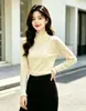 Camiseta base de punto de dos piezas con núcleo de lana hilada, estilo dulce, cuello alto simple con volantes, suéter grueso nuevo de otoño e invierno para mujer