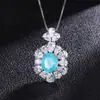Juego de joyería de moda estilo europeo y americano suministro colgante Paraiba de simulación pendiente anillo 10*12 6*8 juego de tres piezas