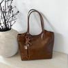 Bolsa de Ombro com Design de Nicho Casual para o Dia a Dia Bolsa Retrô para Mulheres Novo Estilo Verão 2025 Bolsa Tote Texturizada de Grande Capacidade