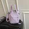 Otoño e Invierno Ligera Versátil Tela de Nylon Bolso de Cubo de Mano para Mujer 2026 Nuevo de Moda Ligero Casual Bolso Cruzado