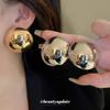 Aretes semicirculares de metal rayado aguja de plata aretes de diseño de industria pesada europeo y americano aretes nicho exagerados de alta gama para mujer