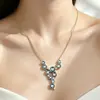 Conjunto de Cuatro Piezas de Collar, Pendientes, Anillo y Pulsera de Cristal Rojo y Azul de Alta Gama Europeo y Americano Transfronterizo con Baño de Oro Rosa para Mujer